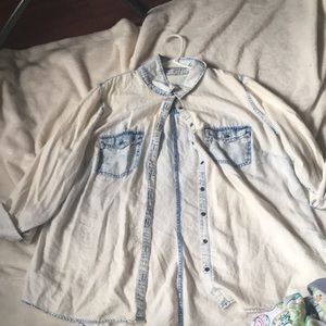 Long sleeve button down shirt.